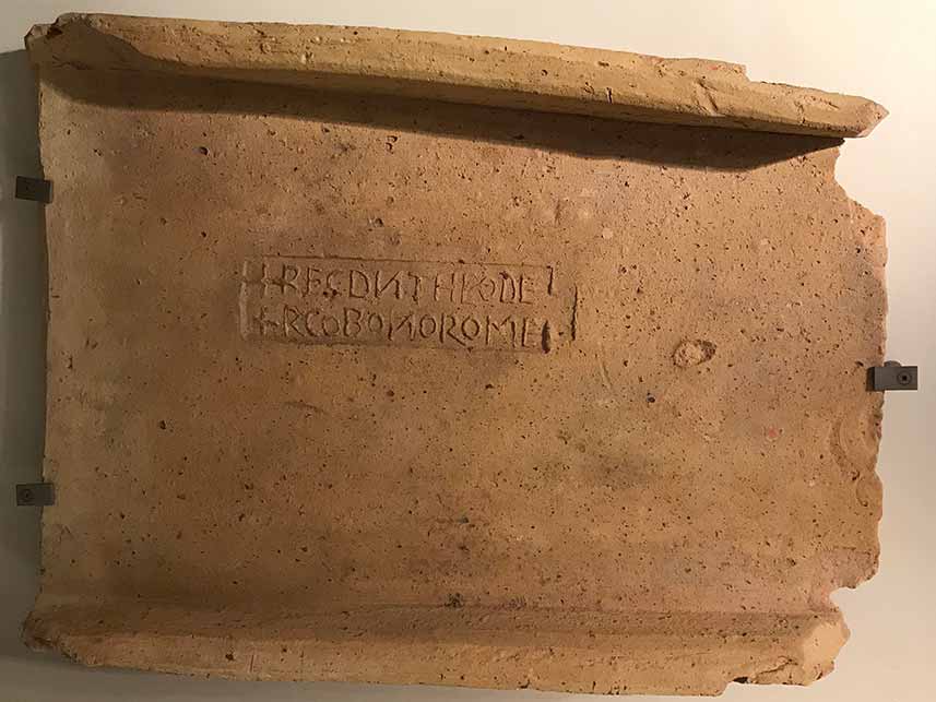 Roman tile stamped with +REG(NANTE) D(OMINO) N(OSTRO) THEODE + RCO BONO ROME.