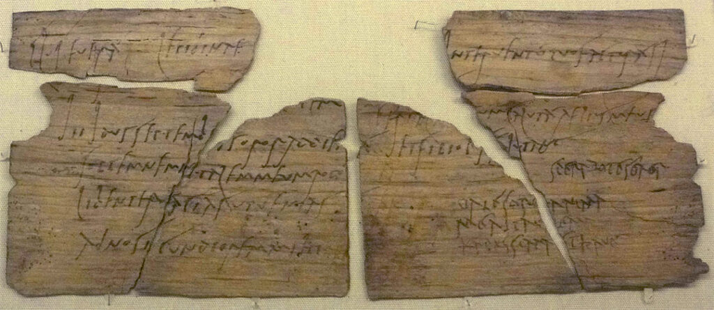 Wood writing tablet from Vindolanda with a party invitation written in ink, in two hands, from Claudia Severa to Lepidina.